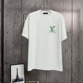 White short-sleeve T-shirt with green logo graphic on front
