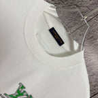 White T-shirt interior neck seam with blue Louis Vuitton fabric label