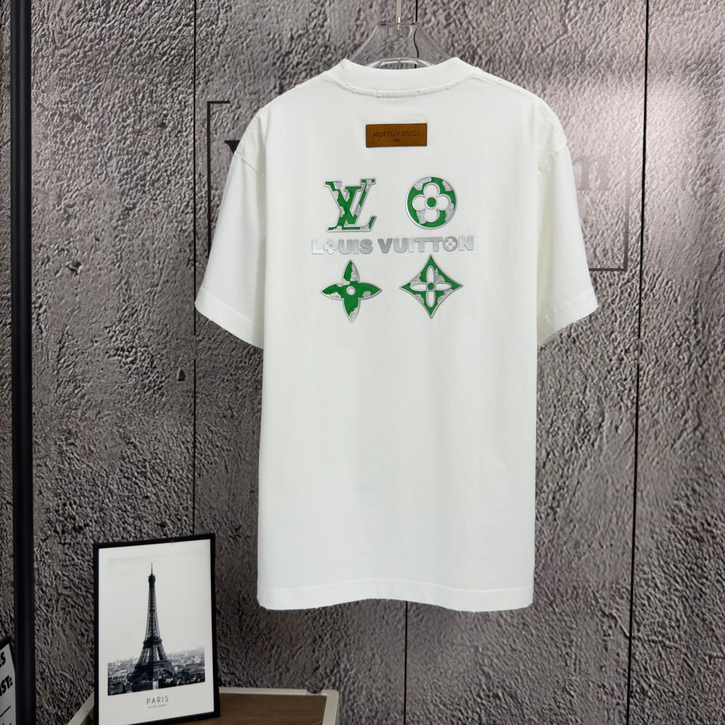 White short-sleeve T-shirt with green and gold logo graphic on back