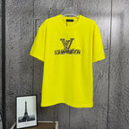 Louis Vuitton yellow T-shirt with LV logo graphic on front