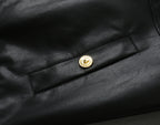Leather jacket front with gold snap button