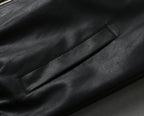 Black leather jacket chest pocket with snap flap