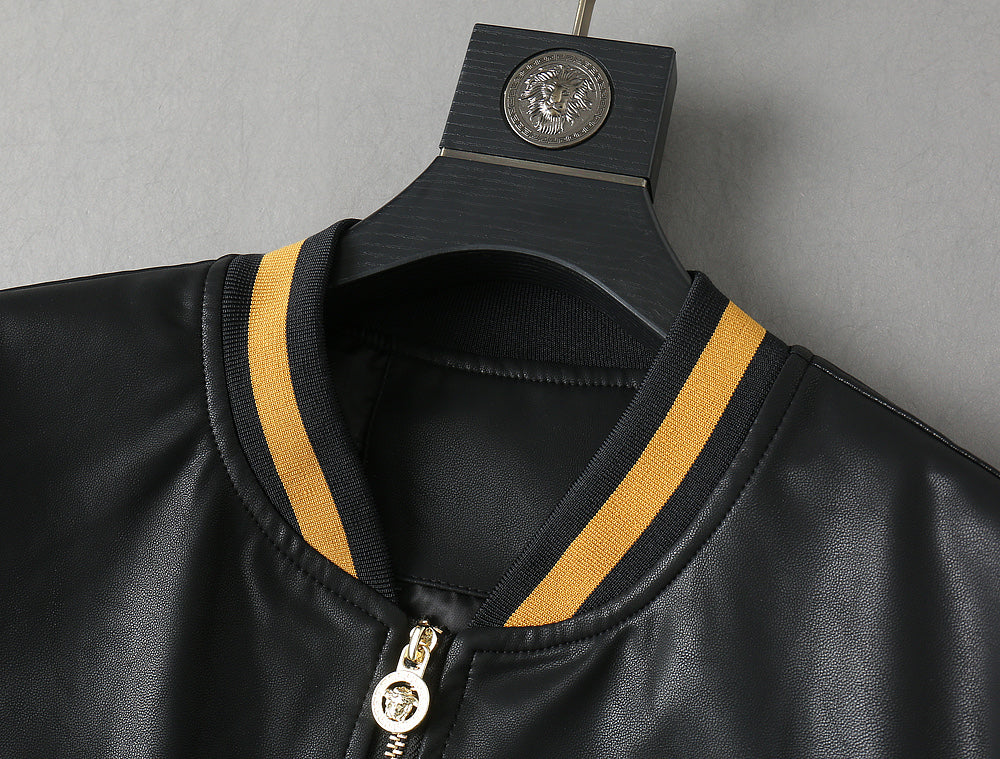 Black leather bomber jacket neckline with gold stripe trim and front zipper ring