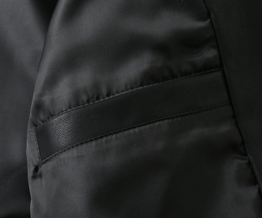 Black leather jacket cuff with stitched trim detail