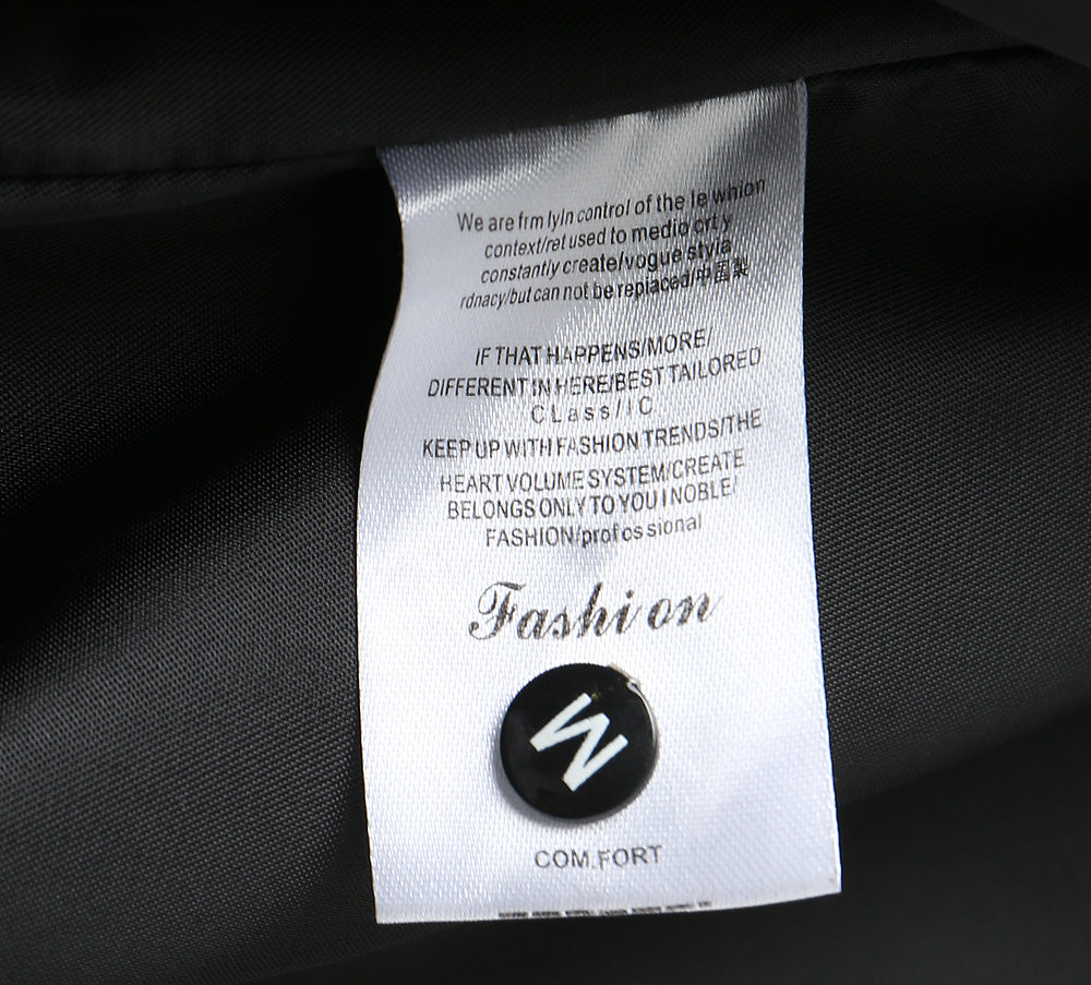 Black and white clothing label reading Fashion and COMFORT