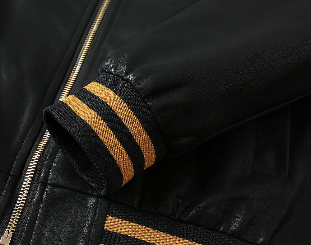 Black leather jacket sleeve with gold zipper and ribbed striped cuff