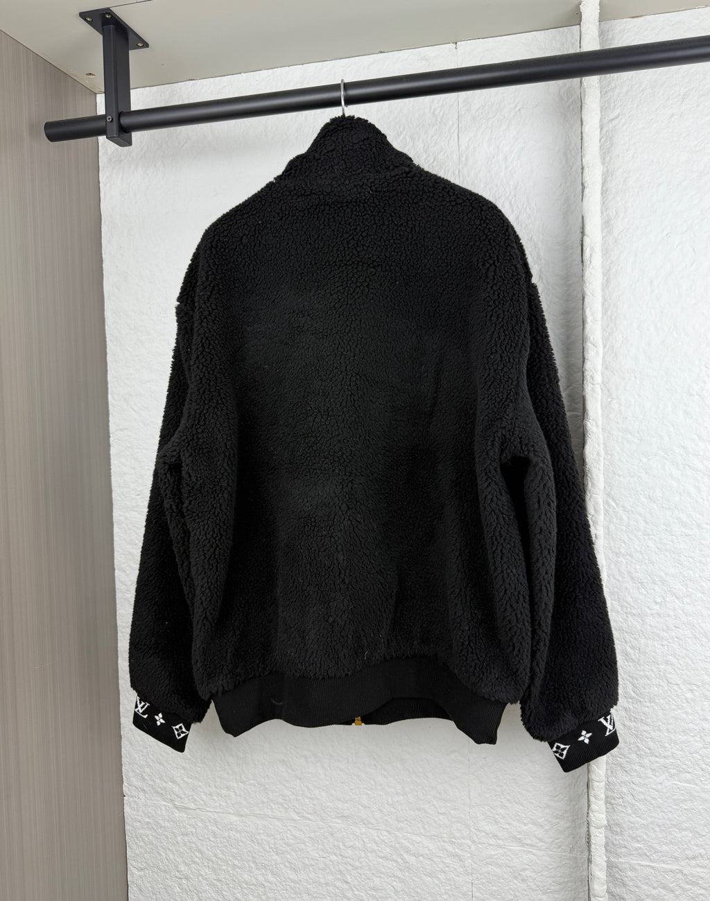 Black Louis Vuitton sherpa zip-up jacket with monogram cuff trim