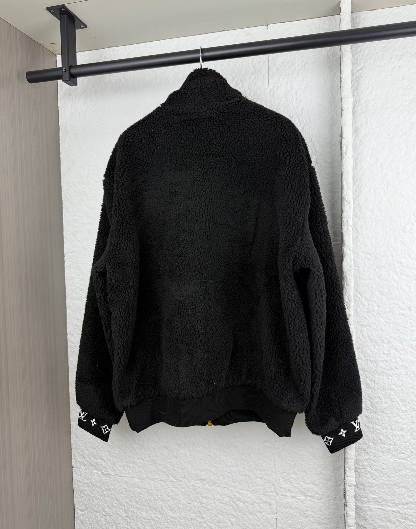 Black Louis Vuitton sherpa zip-up jacket with monogram cuff trim