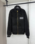 Black Louis Vuitton zip-up sherpa jacket with gold zipper and logo patch
