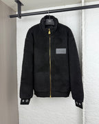 Black Louis Vuitton zip-up sherpa jacket with gold zipper and logo patch