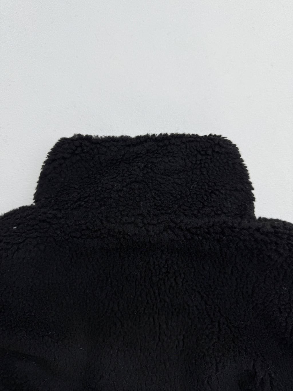 Black sherpa jacket textured collar and shoulders