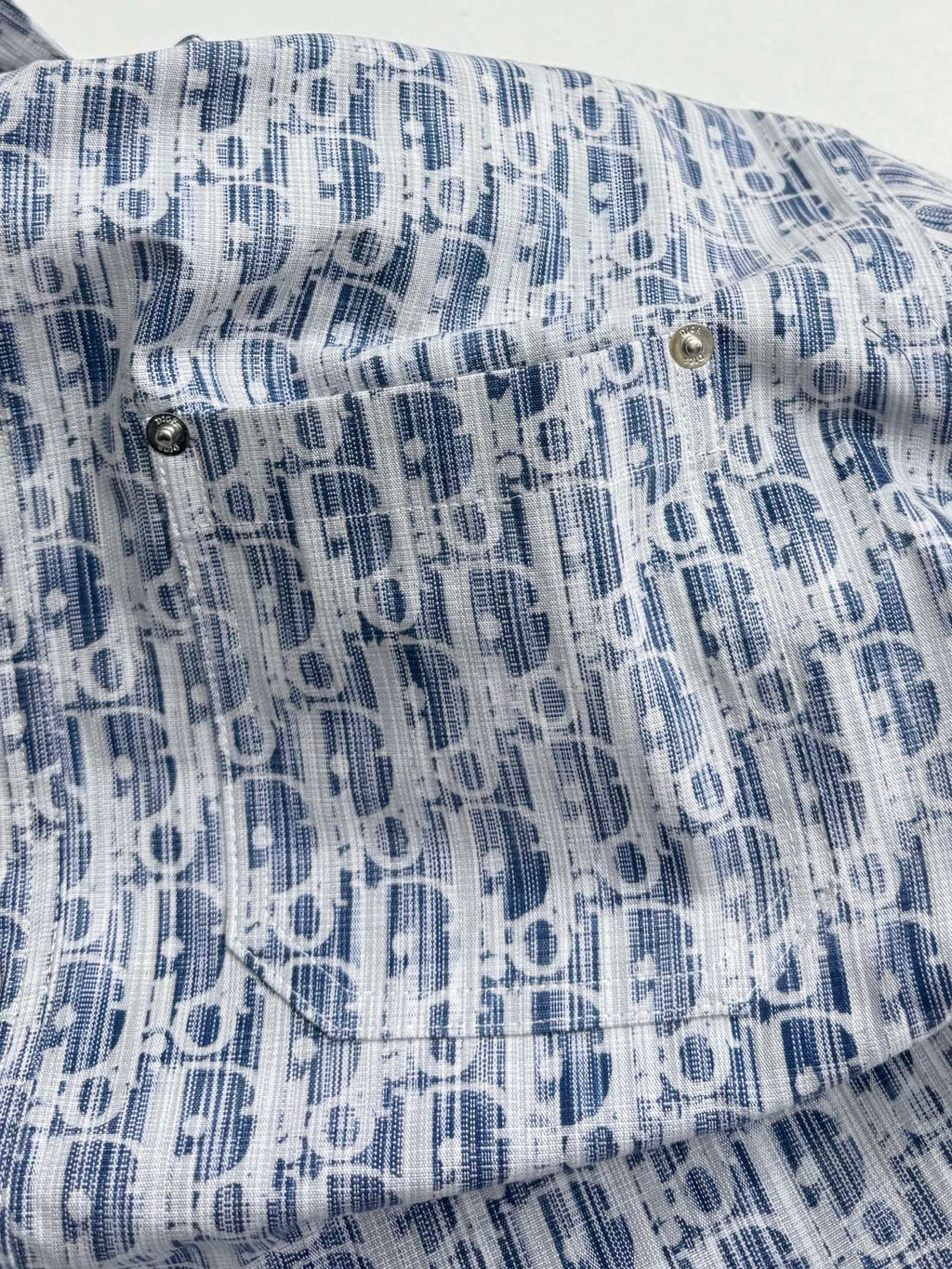 Dior monogram shirt detail with buttons and stitched yoke, blue and white