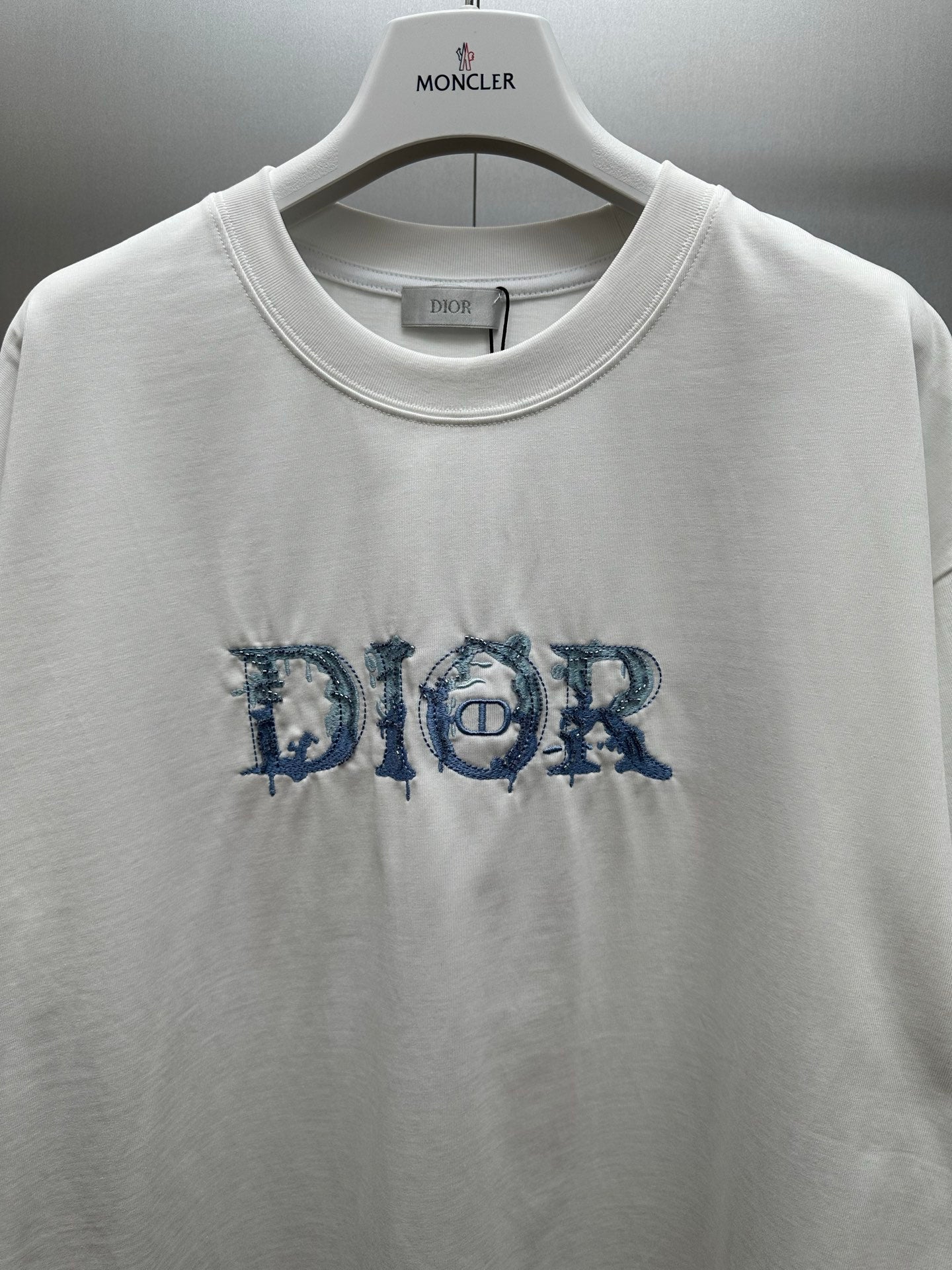 White crewneck T-shirt with blue embroidered-style Dior logo detail