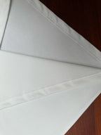Louis Vuitton white short-sleeve shirt with stitched seams and curved hem