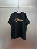 Louis Vuitton black short-sleeve T-shirt with gold script logo on the chest