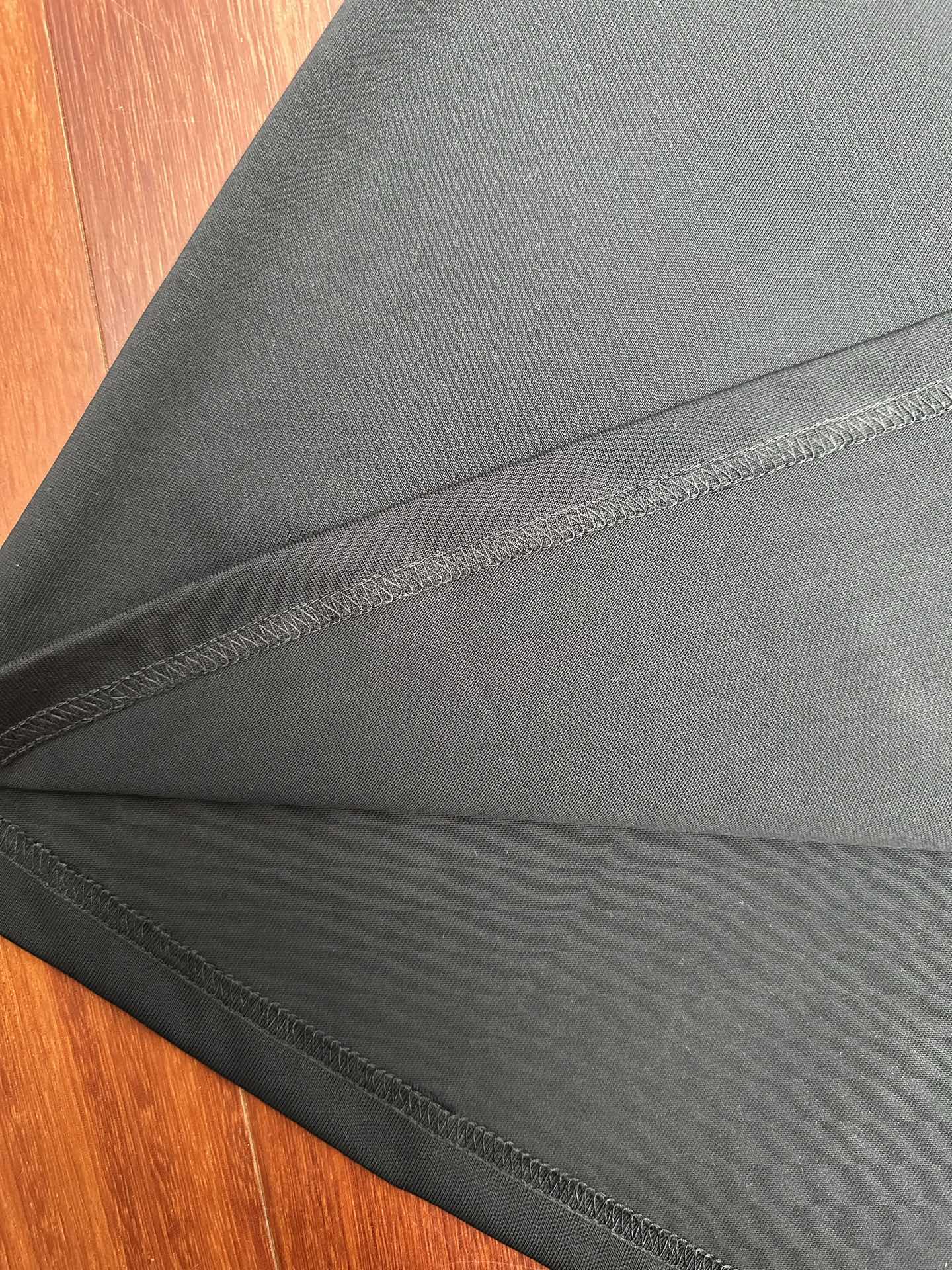 Louis Vuitton T-shirt hem stitching detail, dark gray fabric