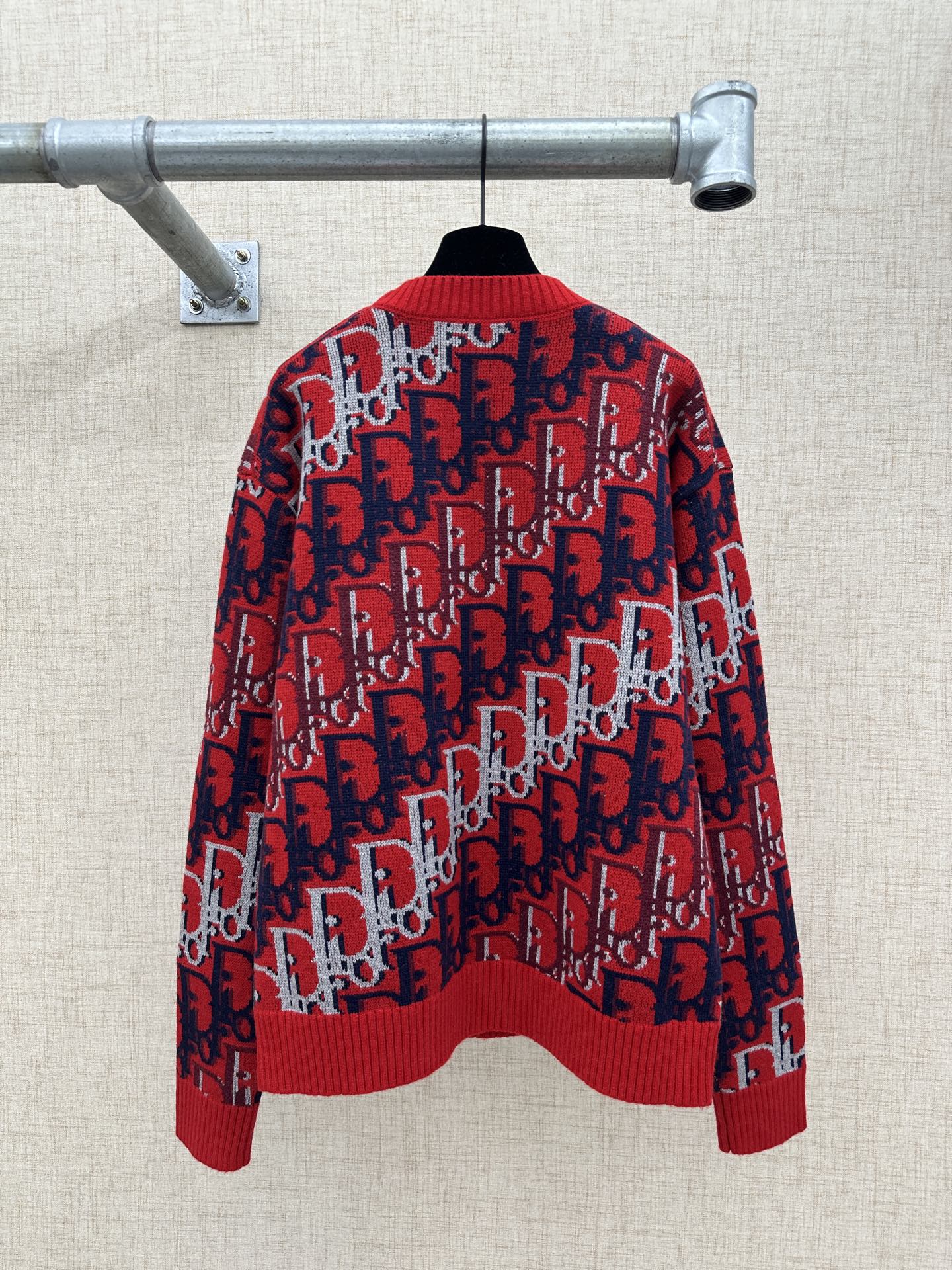 Dior knit sweater with crew neck, red and navy logo pattern, ribbed hem