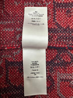 Dior sweater care label tag with fiber composition and washing instructions