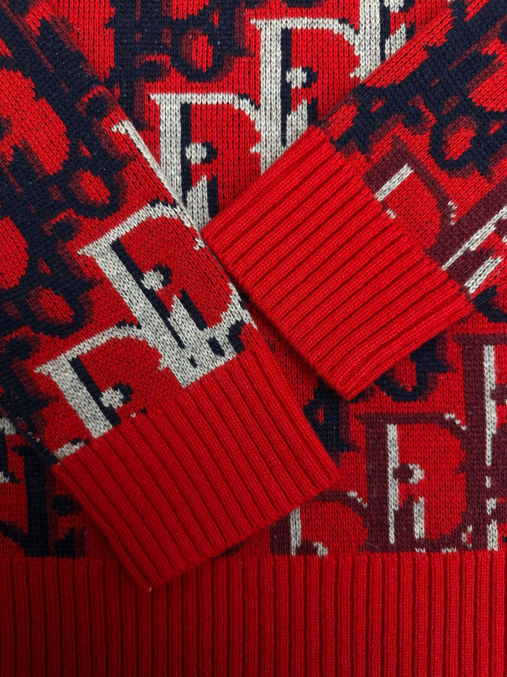 Dior ribbed knit cuffs in red with navy and white logo pattern