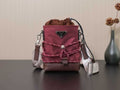 Prada mini bag in burgundy with triangular logo, drawstring top and crossbody strap