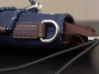 Prada bag strap with brown leather loop and large silver ring buckle detail