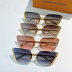 Assorted Louis Vuitton sunglasses with gold frames and gradient lenses in purple and brown