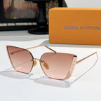 Rose-tinted Louis Vuitton sunglasses with gradient lenses and cat-eye gold frames