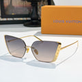 Gold-tone Louis Vuitton sunglasses with gradient purple lenses and cat-eye frames