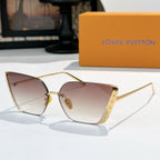 Gold-tone Louis Vuitton sunglasses with gradient brown lenses and cat-eye frames