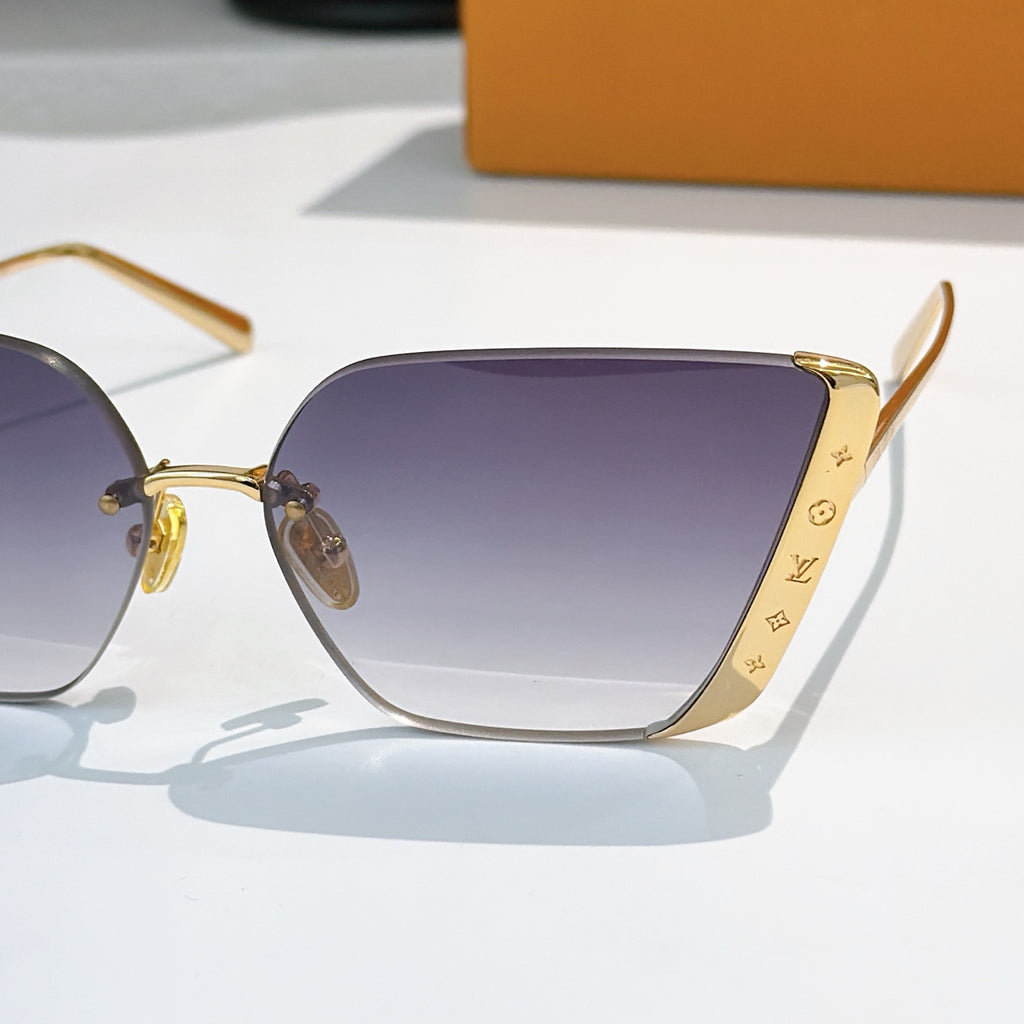 Close-up of gold-tone Louis Vuitton sunglasses with gradient purple lenses and temples
