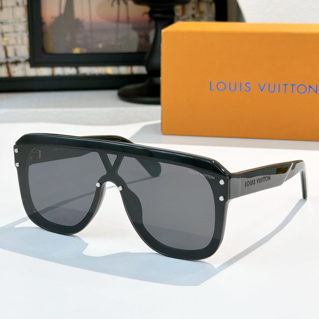 Black sunglasses with dark lenses and chunky geometric frame