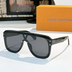 Black sunglasses with dark lenses and chunky geometric frame