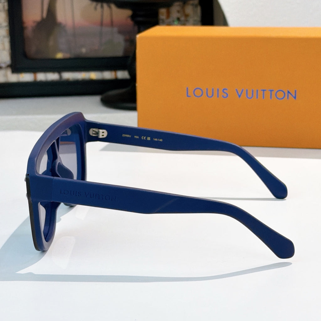 Blue sunglasses with straight temples and protective frame detail