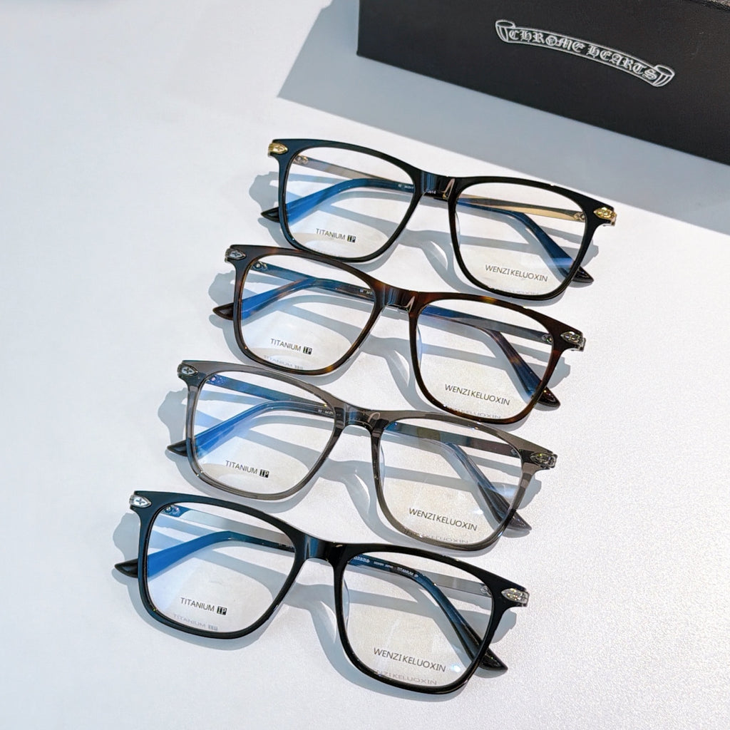Set of blue-accent eyeglasses with clear lenses on display.