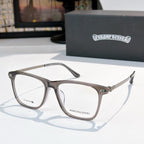 Silver and dark eyeglasses with clear lenses, rectangular frames.