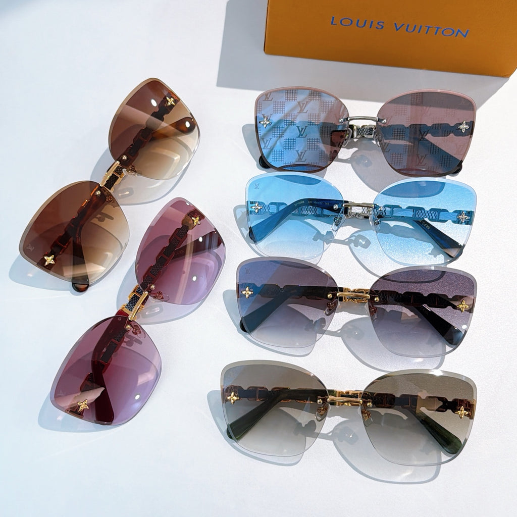 Assorted designer sunglasses with mixed blue, brown, and dark lenses