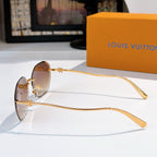 Louis Vuitton gold sunglasses with brown lenses, metal temple detail