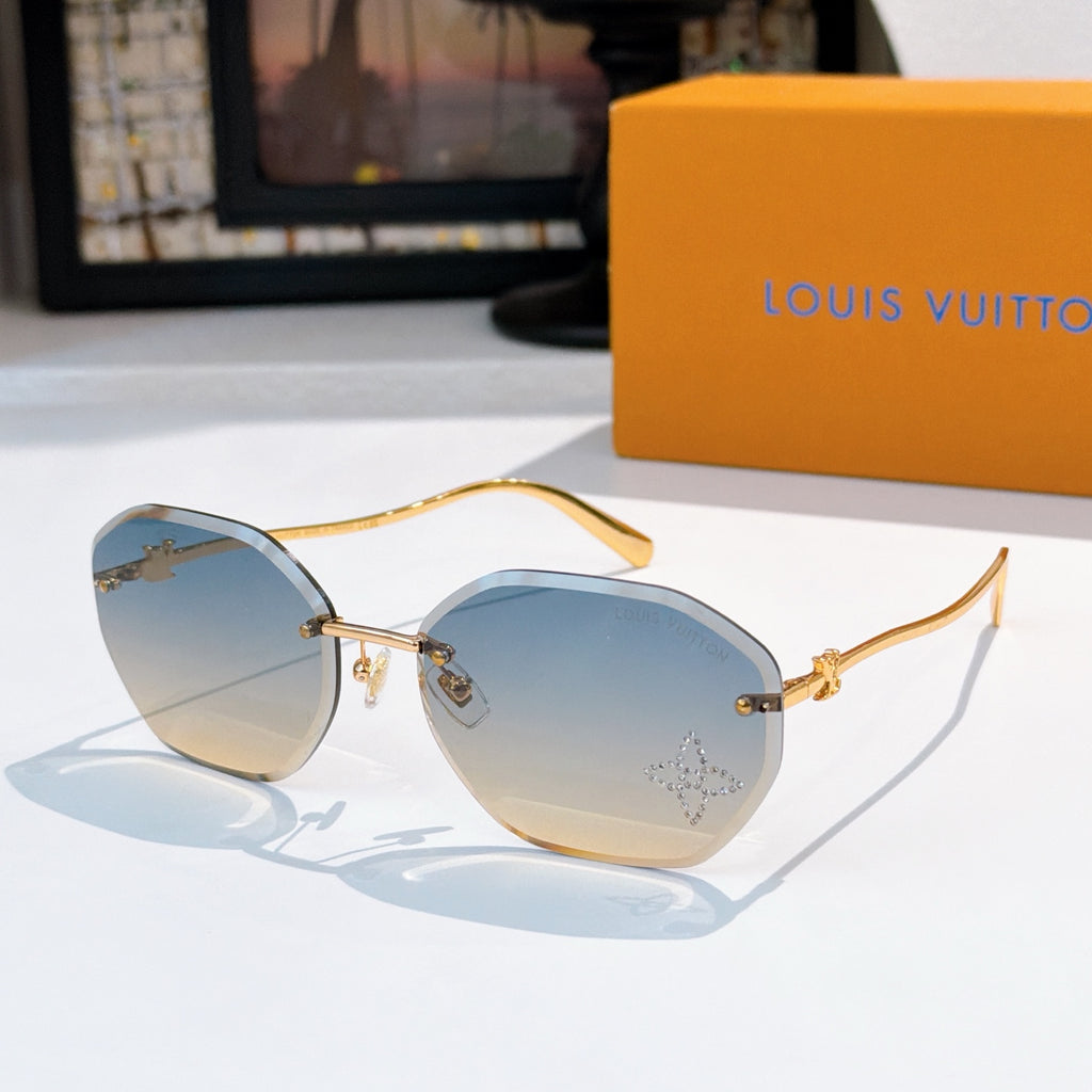 Louis Vuitton gold sunglasses with blue lenses, round cat-eye frame