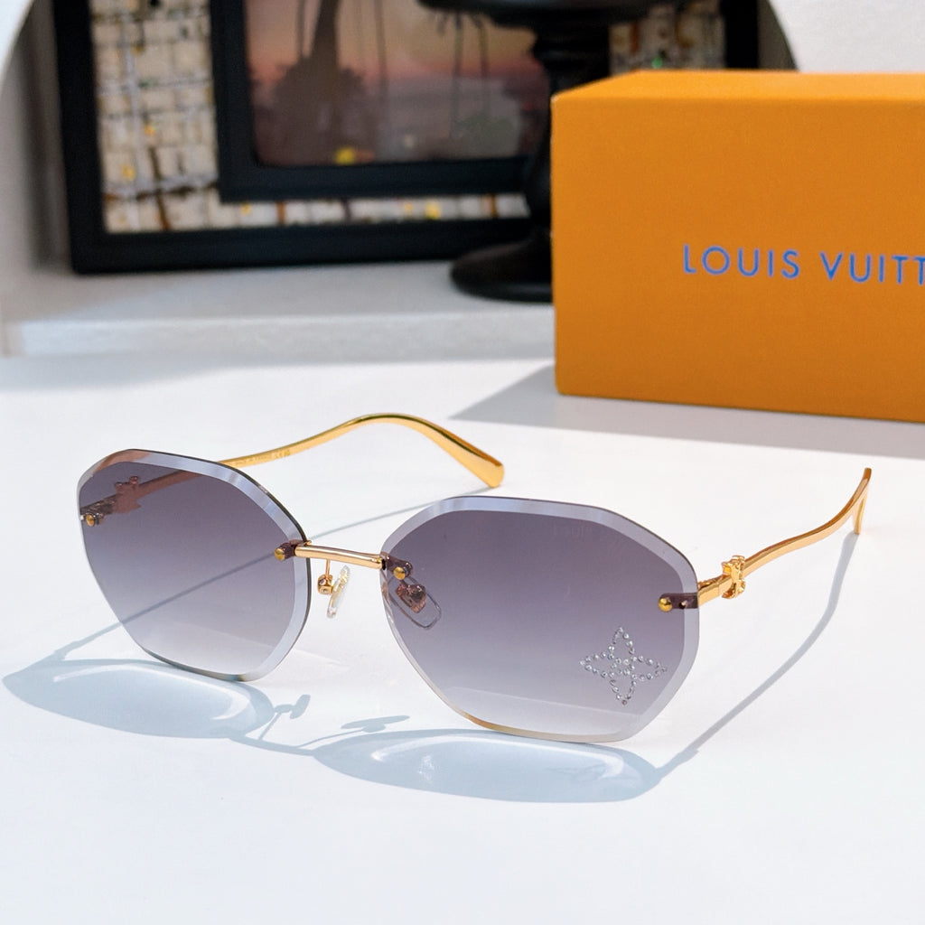 Louis Vuitton gold sunglasses with gray-lavender lenses, round cat-eye frame