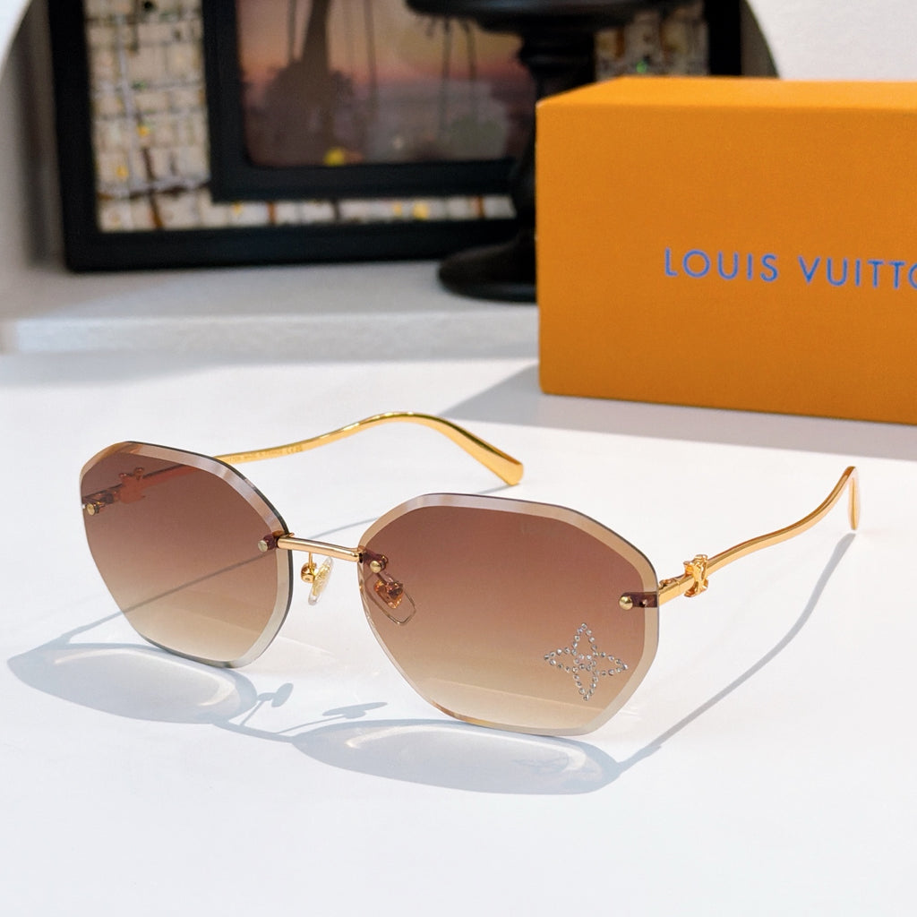 Louis Vuitton gold sunglasses with brown lenses, round cat-eye frame