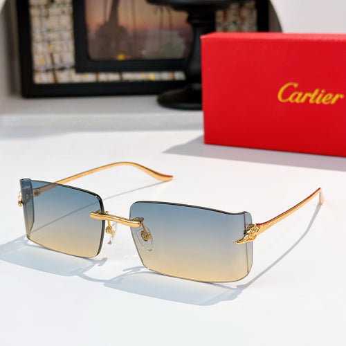 Cartier sunglasses with blue gradient lenses, gold metal frame, rectangular