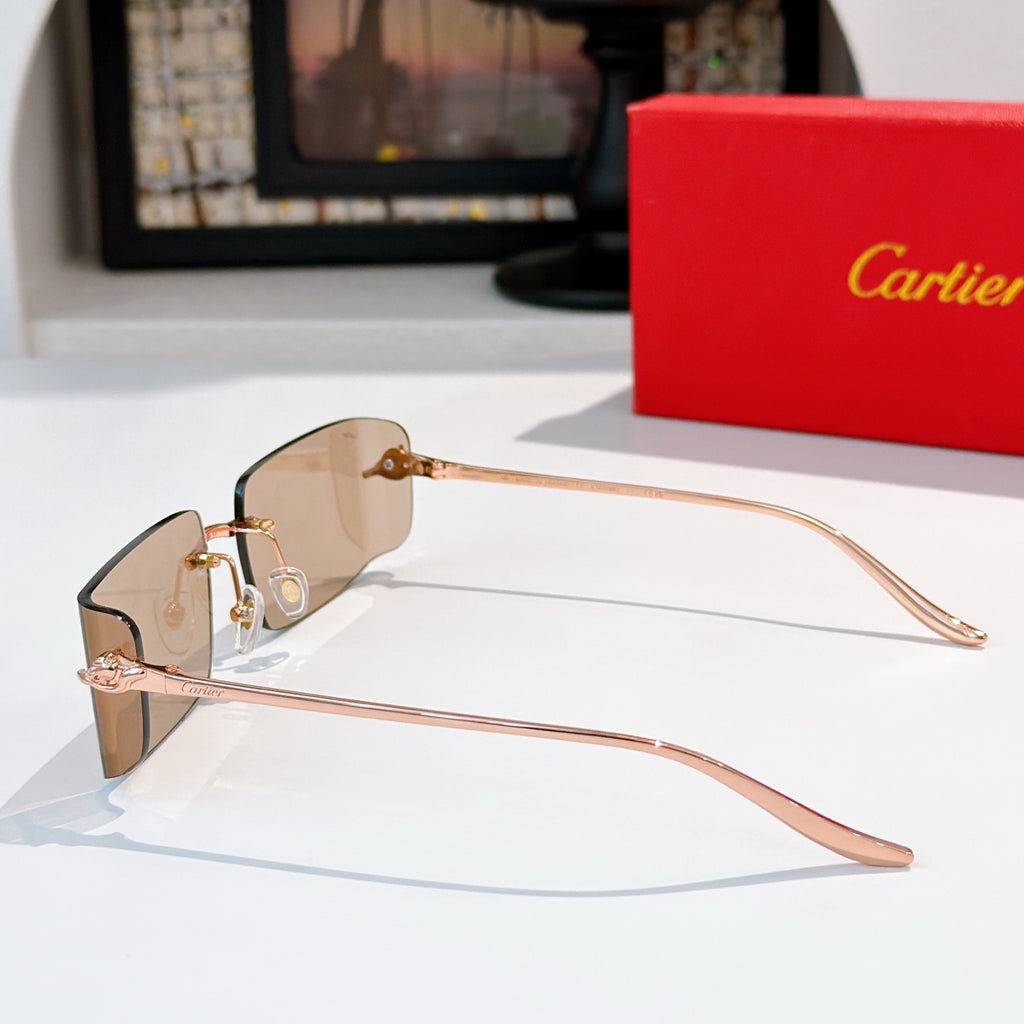Cartier sunglasses side profile with tan gradient lenses, rose-gold metal frame