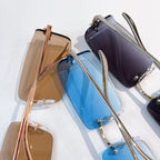 Cartier sunglasses stack with brown and blue tinted lenses, metal frames