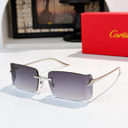 Cartier sunglasses with dark blue gradient lenses, silver metal frame, rectangular