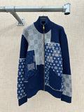 Long-sleeve knit jacket in navy and gray with patchwork panels and full zip front