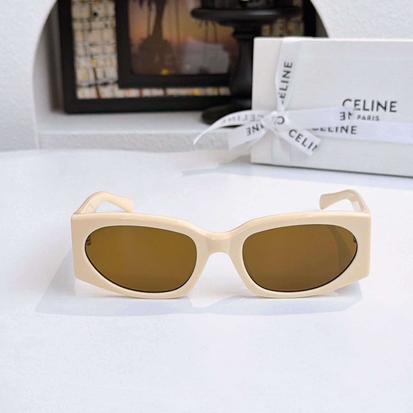 Celine cream sunglasses with brown lenses, front view