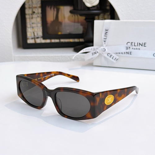 Celine tortoiseshell sunglasses with dark lenses, angled view