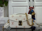 Louis Vuitton crossbody bag with flap, gold chain strap, light cream monogram pattern