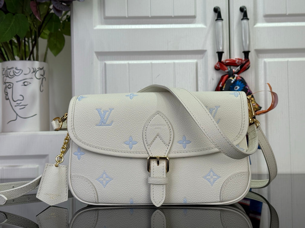 Louis Vuitton monogram shoulder bag with flap buckle and crossbody strap, cream/blue