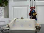 Louis Vuitton monogram crossbody bag with top flap and chain strap, cream/blue